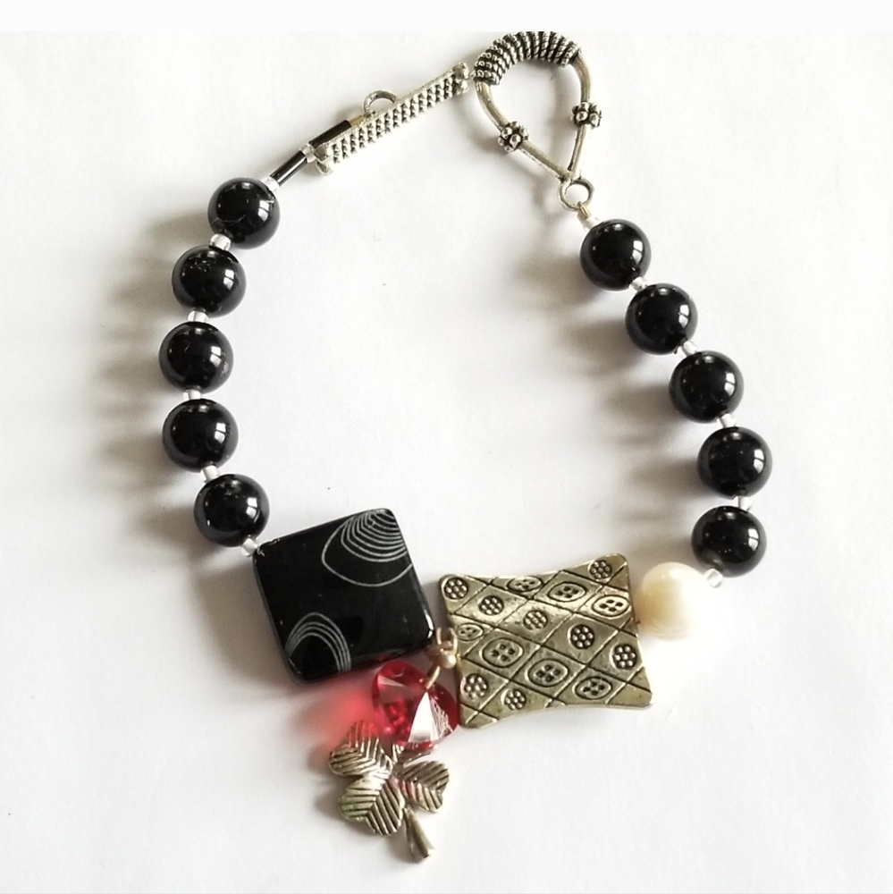 Handmade bracelet black silver red bead beaded shamrock 4 leaf clover